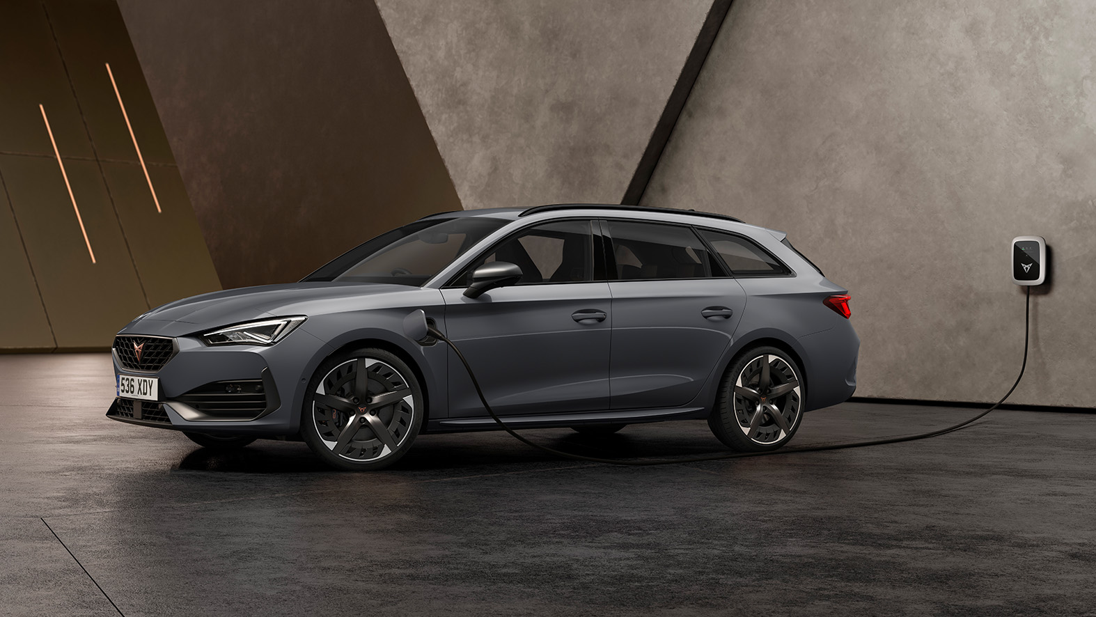 cupra leon estate plugged into charging point