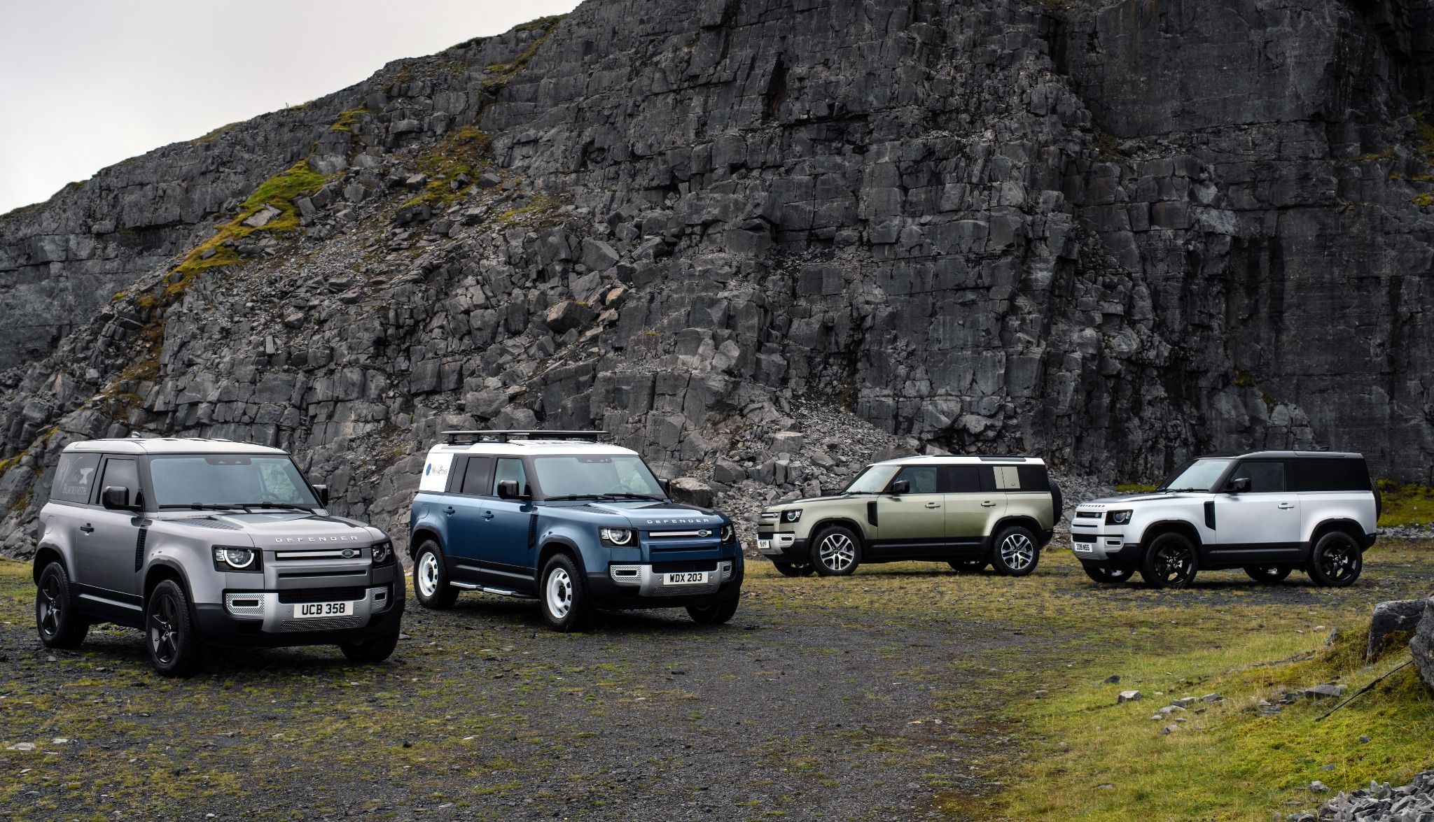 Group of Land Rover Defender cars