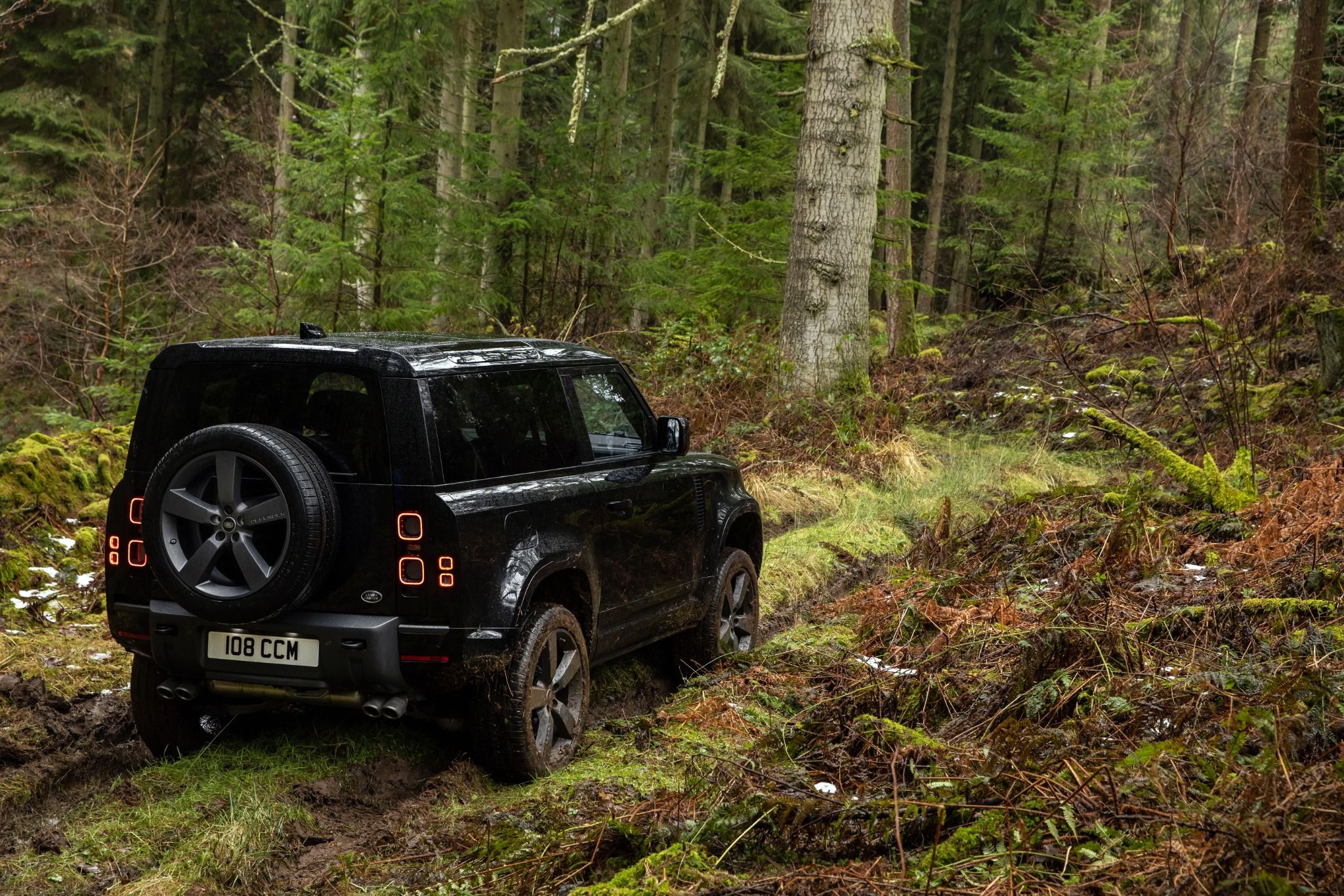 Land Rover Defender in the woods