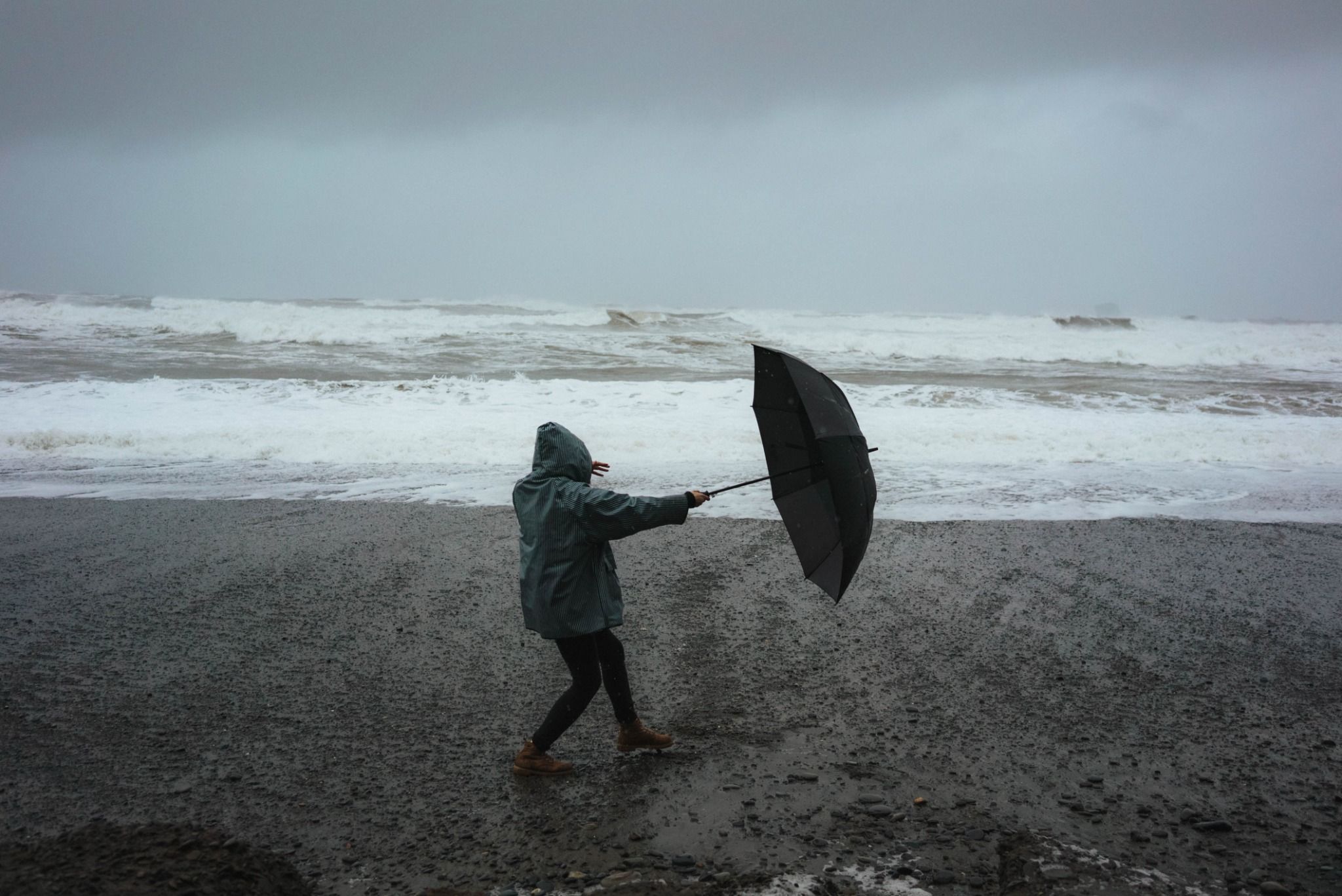 Woman walking in storm