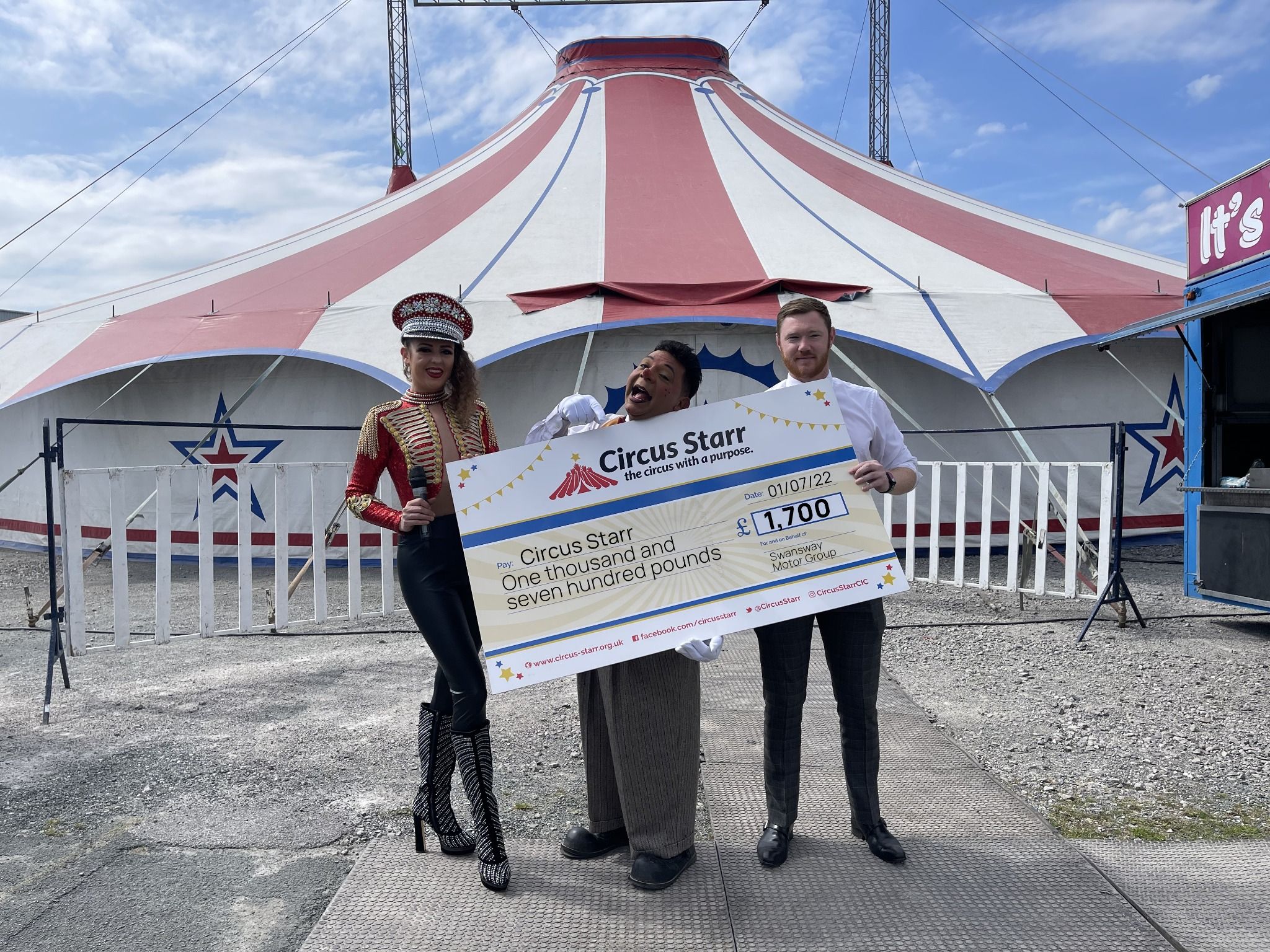 Swansway Motor Group visit Circus Starr  show with the latest donation. image